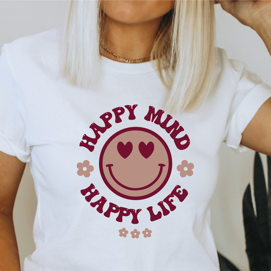 a woman wearing a happy mind happy life t - shirt
