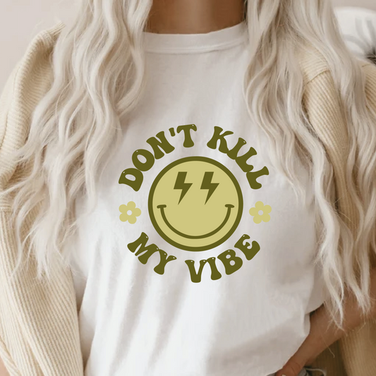 a woman wearing a t - shirt that says don't kill my vibe