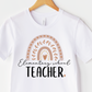a white t - shirt with a rainbow on it that says elementary school teacher