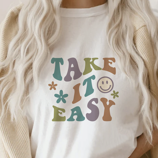 a woman wearing a t - shirt that says take it easy