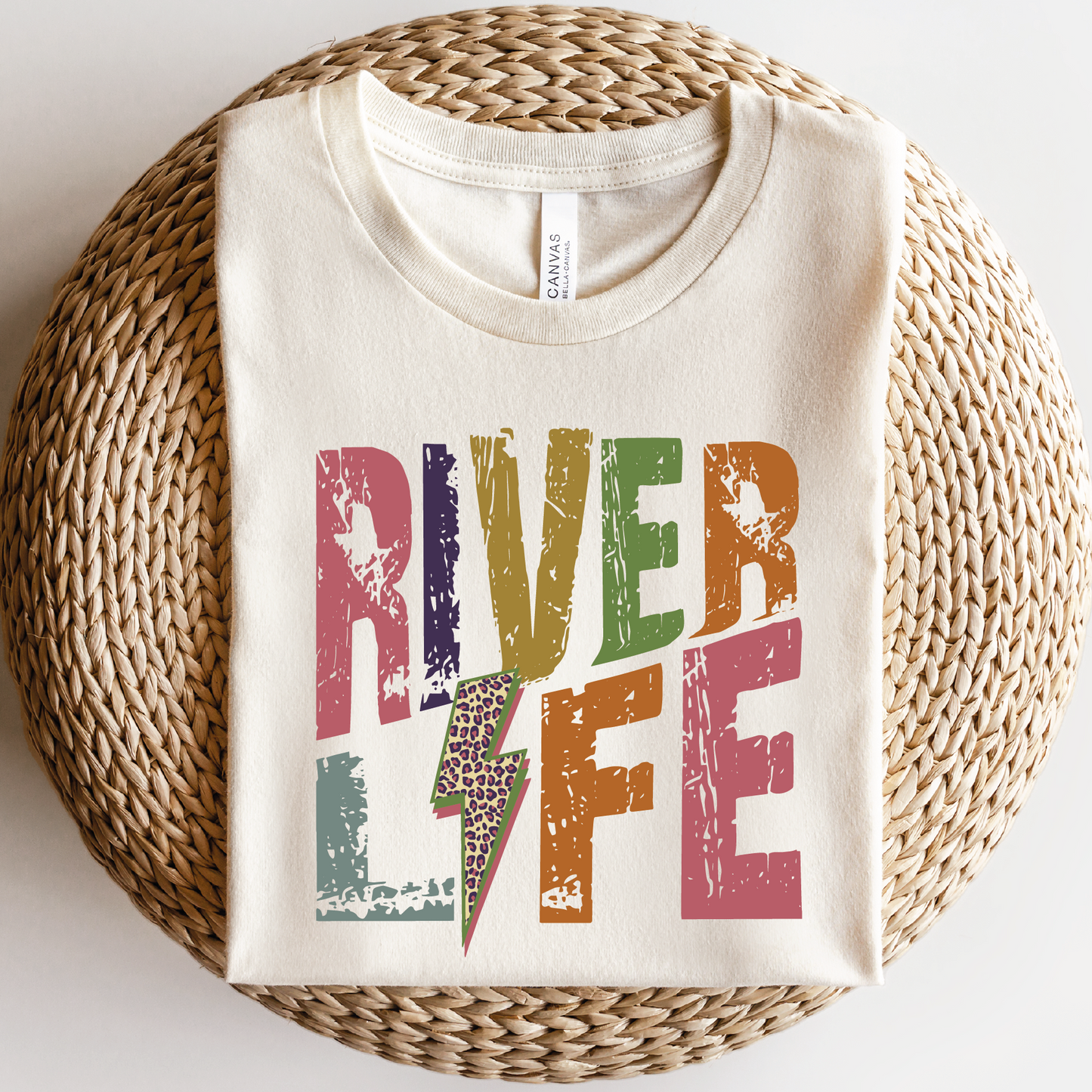 a white shirt that says river life on it